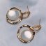 white pearl earrings